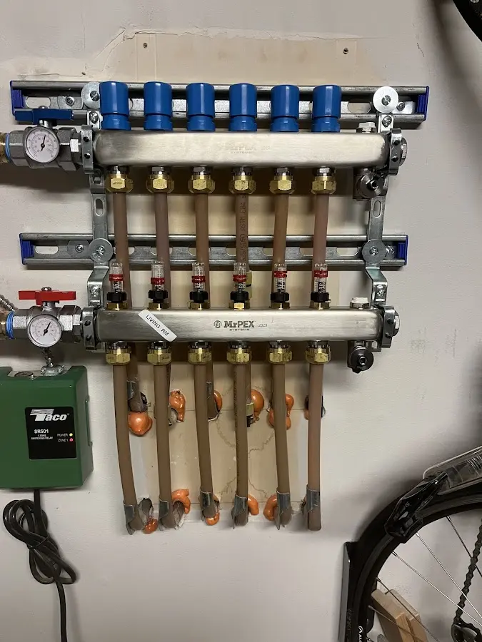 Plumber performing Gas Line Installation at a residential property in Ennis